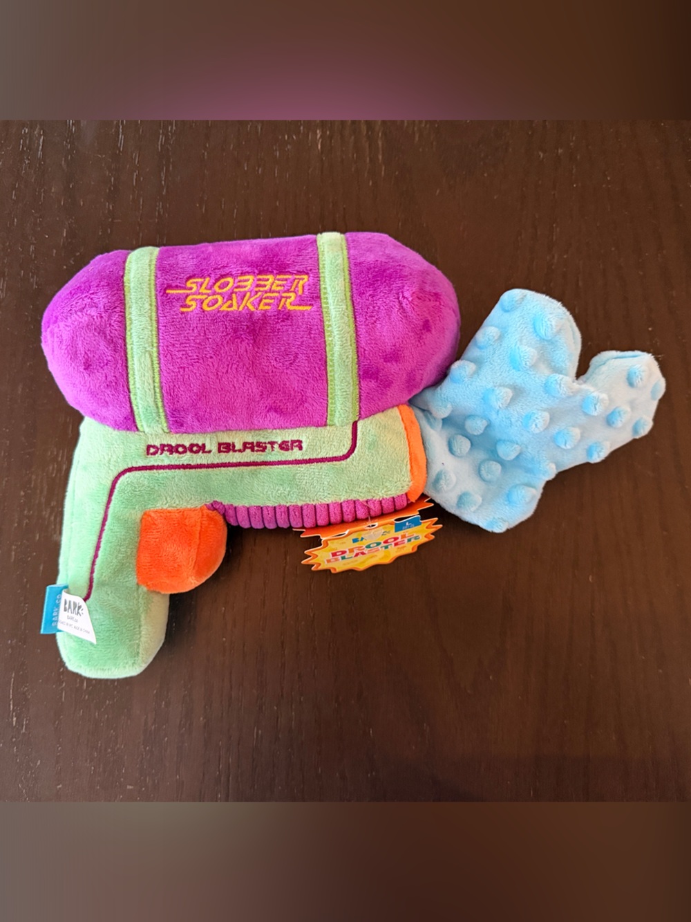 Slobber Soaker Drool Blaster Plush Dog Toy - Purple, Green, Blue & Orange